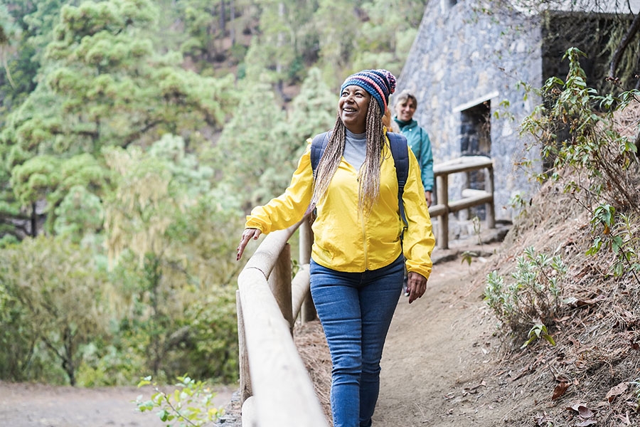 Woman walking on hiking trail