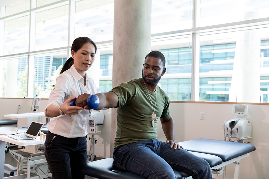 Burn survivor stretching in rehabilitation