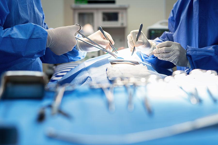 Surgeons performing a heart transplant