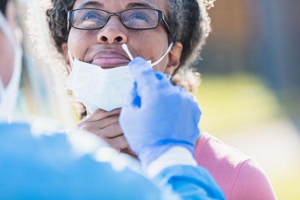 Woman receiving COVID test