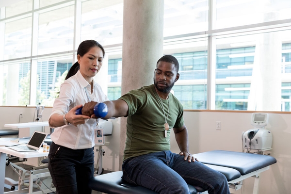 Burn survivor stretching in rehabilitation
