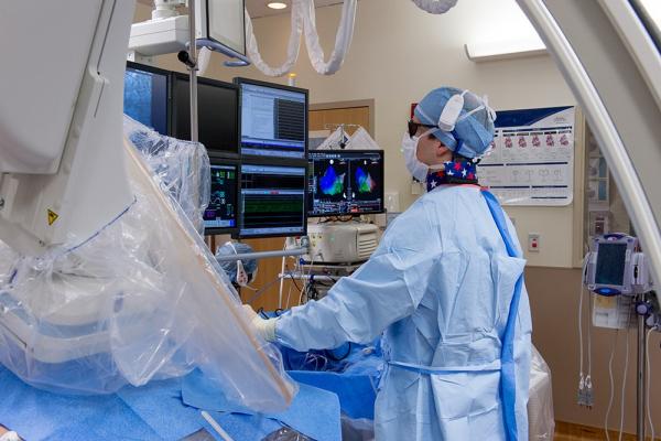 Joshua Cooper, MD working in electrophysiology lab